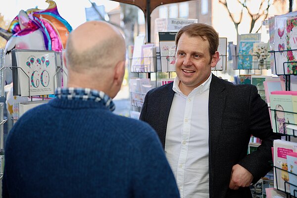 Luke and shopkeeper