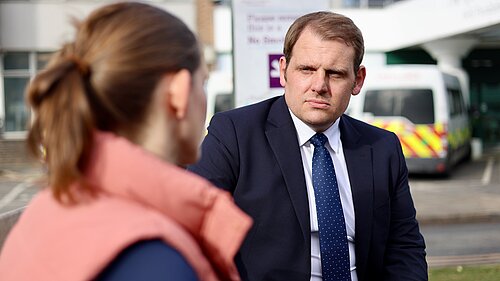 Luke Taylor MP talking to a constituent
