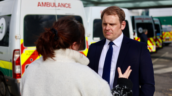 Luke Taylor with ambulances